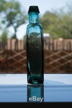 Early Teal G. W. MERCHANT LOCKPORT. N. Y. Civil War Era Bottle