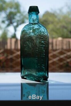 Early Teal G. W. MERCHANT LOCKPORT. N. Y. Civil War Era Bottle