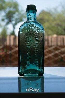 Early Teal G. W. MERCHANT LOCKPORT. N. Y. Civil War Era Bottle