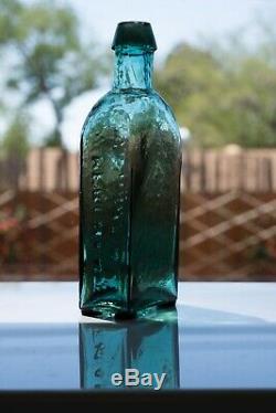 Early Teal G. W. MERCHANT LOCKPORT. N. Y. Civil War Era Bottle