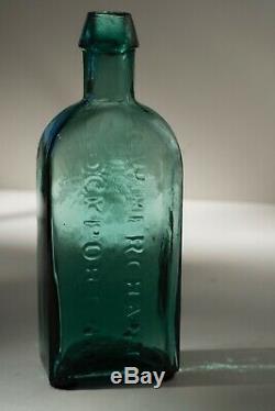 Early Teal G. W. MERCHANT LOCKPORT. N. Y. Civil War Era Bottle